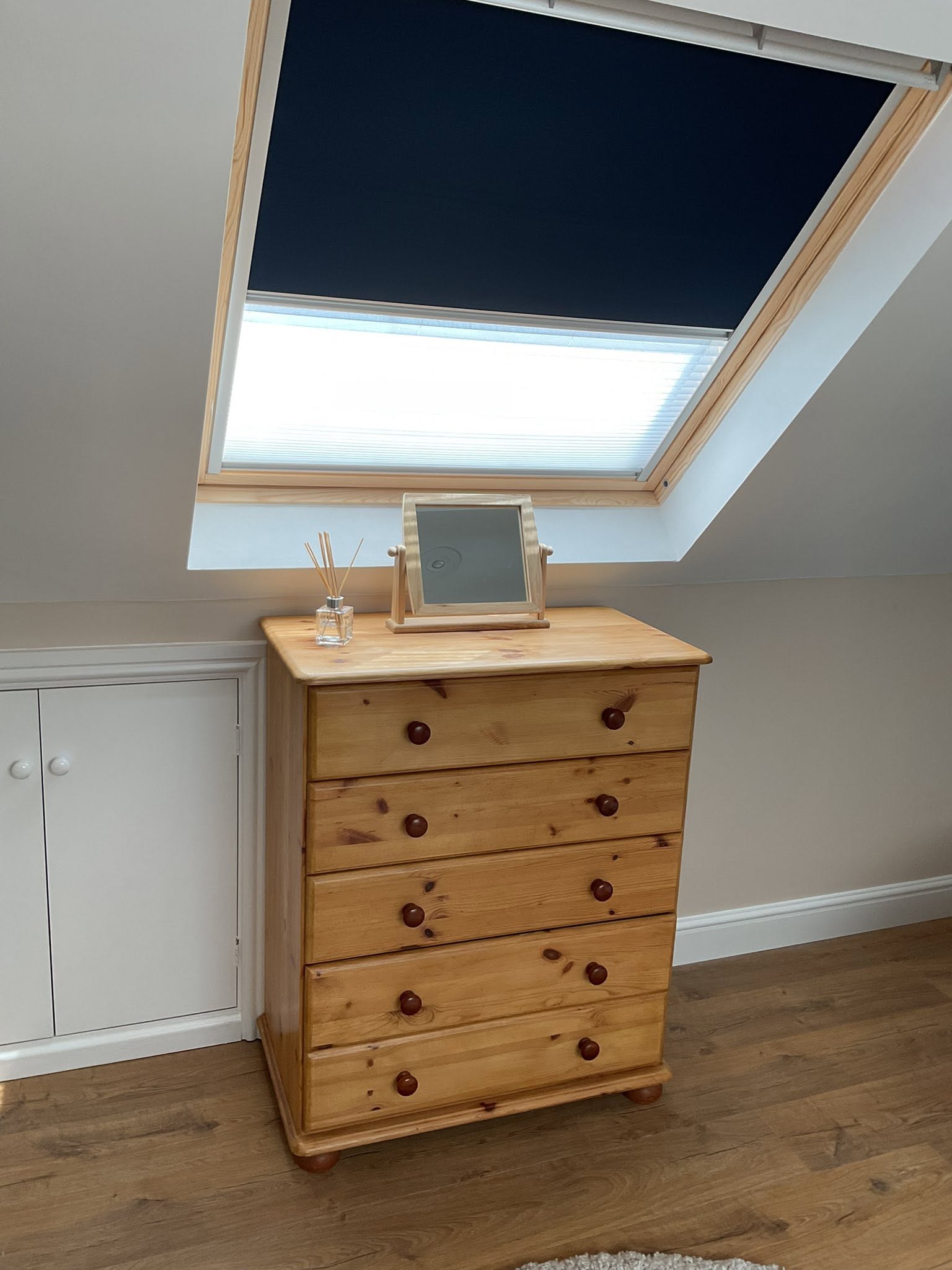 The bedroom upstairs, looking towards the window