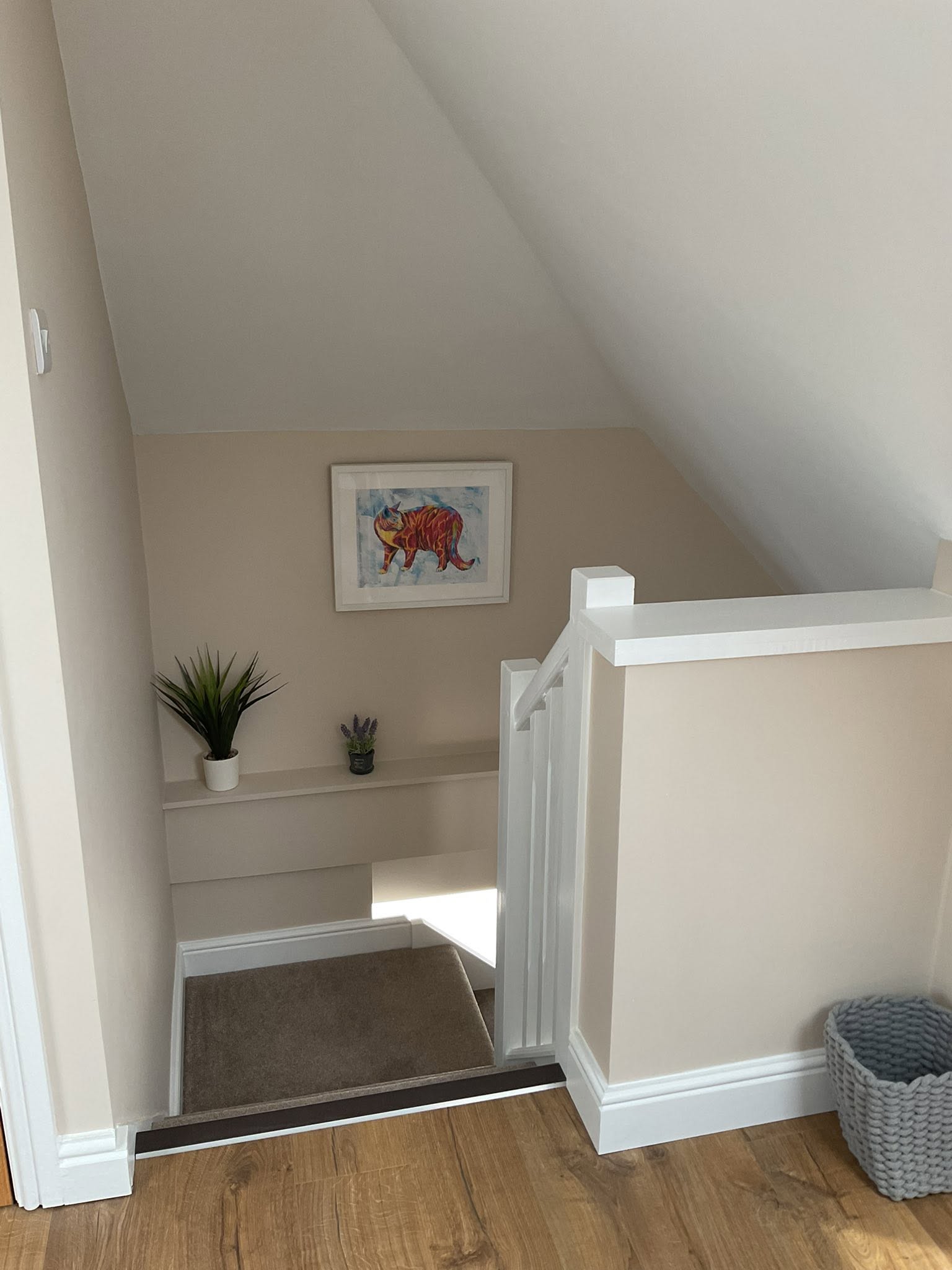 The bedroom upstairs, looking towards the window